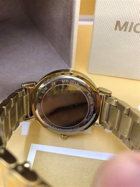 michael kors watch serial number verification|knockoff michael kors handbags.